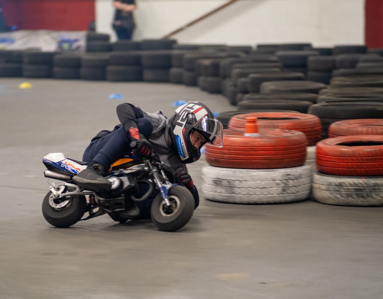 mini gp racer taking a corner at high speed